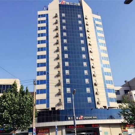 فندق جينجيانج إن زيشوان تونجكيان سكوير تزيبو المظهر الخارجي الصورة
